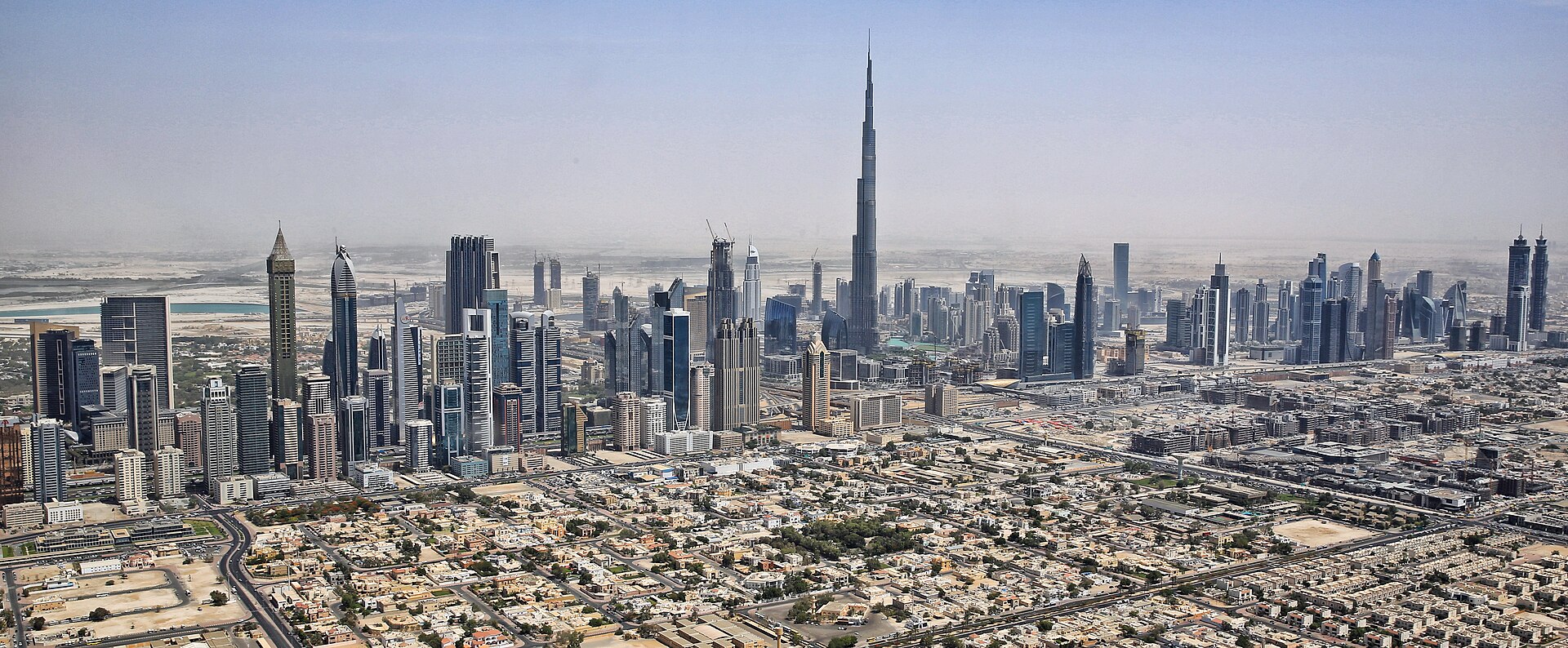 Dubai (DXB) — สนามบินคอริดอร์แรงงาน GCC ไป Saudi, UAE, Qatar, Kuwait, photo via Wikimedia Commons (media-list scan)